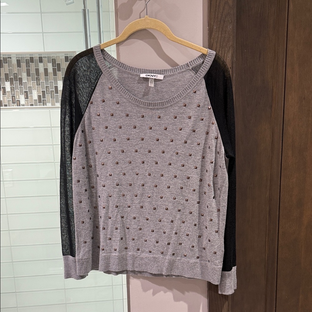 Gray Sweater with Black Sleeves and Studded Accents
